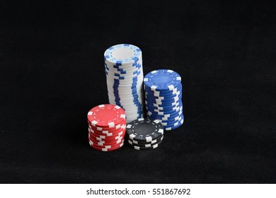 gambling chips on a black background
