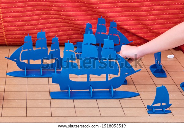 The game of\
battleship large models of sailing ships. The field is divided into\
cells, sailboats and chalk to indicate hit. Sea battle as a Board\
game version for two\
players.