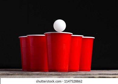 Game Beer Pong On Wooden Table