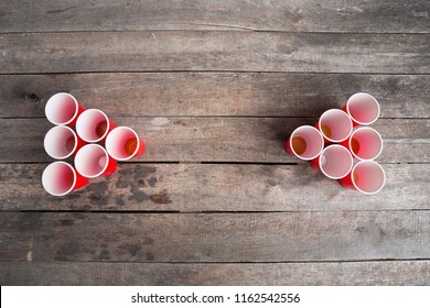 Game Beer Pong On Wooden Table