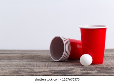 Game Beer Pong On Wooden Table