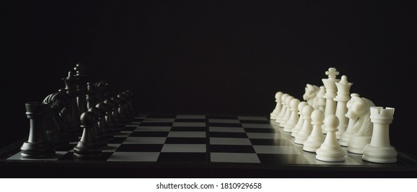 Game Of Chess. Black Pieces On The Left, White Pieces On The Right. Waiting For The Start. The Concept Of Business Strategy, Startup, Success. Depth Of Field