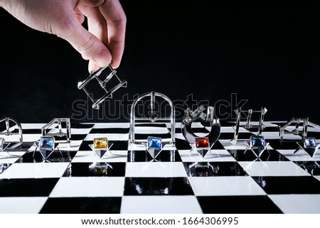 game of chess. Chess board. accessories for shoes on a chessboard. metal decor on a chessboard. buckle for shoes. the game