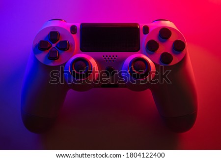 Game controller with blue and red lights - Selective Focus