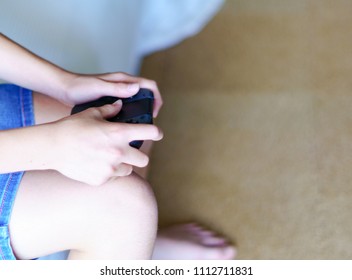 game controller and hand 