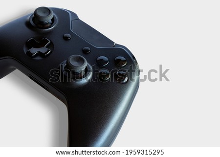 Game controller on white background. Selective focus. Space for text.