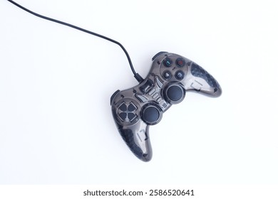 Game controller with wire on white  background, top view. 