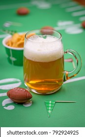 Game Day Beer And Snacks On Table Decorated For The Superbowl