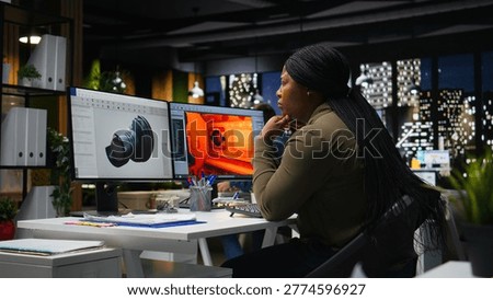 Game developer creates Mars based virtual station using AI tools. Futuristic program processing data with machine learning and automation to optimize game design and development. Camera A.