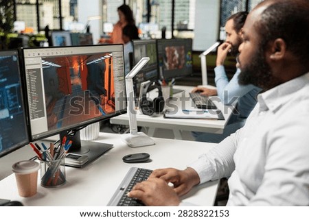 Game developer uses AI neural networks, virtual assets and software commands to create a futuristic spatial video game, combining programming tools, game assets and digital environment design