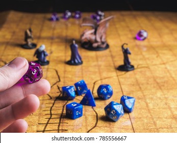 Game field of roleplaying party with dices and miniatures.
