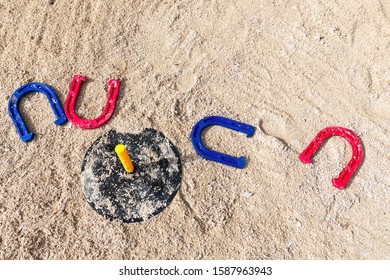 Game Of Horseshoe On Beach