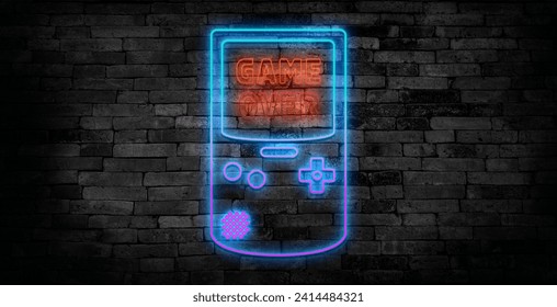 Game over text on gaming console neon sign on a drak brick wall background. - Powered by Shutterstock