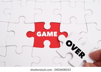 Game Over word alphabet letters on puzzle as a background