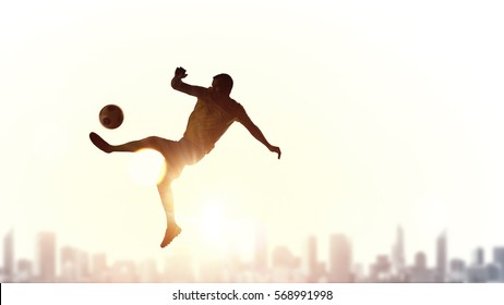 サッカー シルエット キック の写真素材 画像 写真 Shutterstock