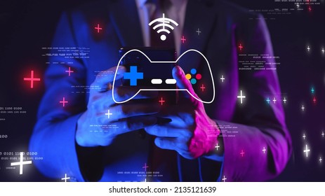 GameFi DeFi futuristic NFT Game decentralized finance play to earn, online digital technology. Businessman with mobile phone graphic icon modern game business investment idea