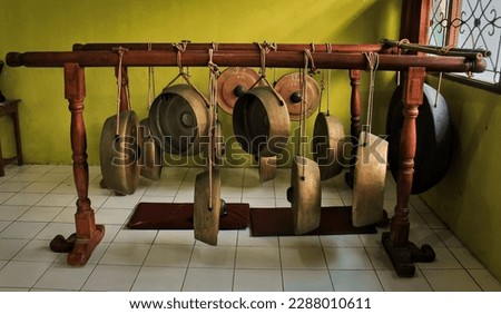 Gamelan is traditional musical instrument from Java. Gong is a part of gamelan. gamelan gong made of metal. Gamelan is part of Indonesian culture