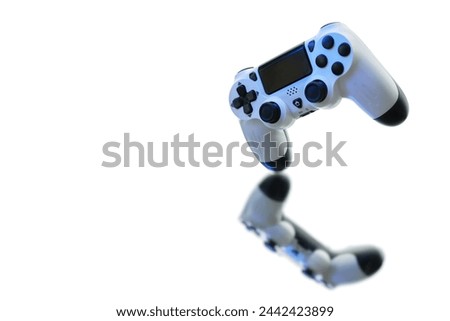 Gamepad on white background with reflection. Gamer and Game concept. Gaming background with copy space