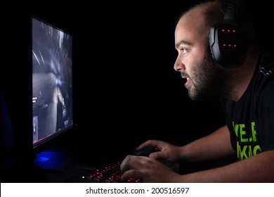 Gamer Playing A First Person Shooter On High End Pc.