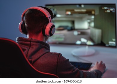 The Gamer Playing Video Game On His Personal Computer