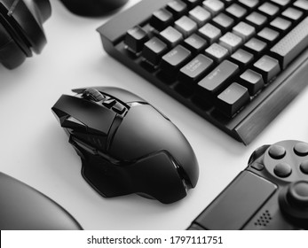 Gamer Work Space Concept With Gaming Gear, Mouse, Keyboard, Joystick, Headset On White Table Background.