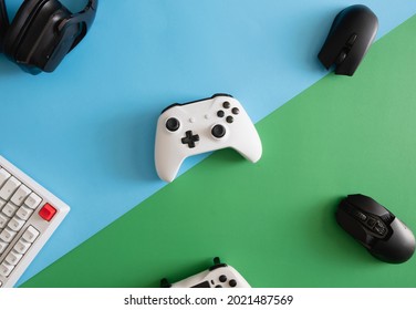 gamer work space concept, top view a gaming gear, mouse, keyboard, joystick, headset.