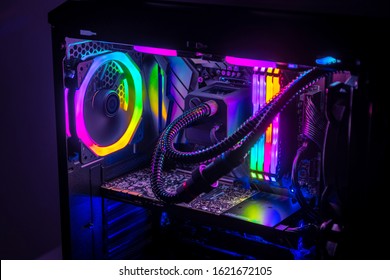 Gaming PC with RGB LED lights on a computer, assembled with hardware components - Shutterstock ID 1621672105