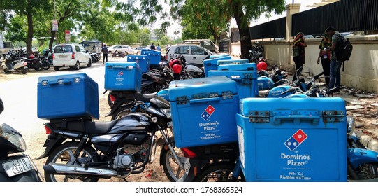 GANDHINAGAR, GUJARAT/INDIA - JUNE 18, 2020: Domino's Pizza Delivery Vehicles During Coronavirus Pandemic.