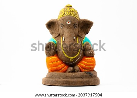 Ganesha idol made out of clay, husk and dung.