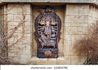 Ganesha statue outdoors at the wall of the Temple
