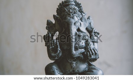 Ganesha statuette close-up.