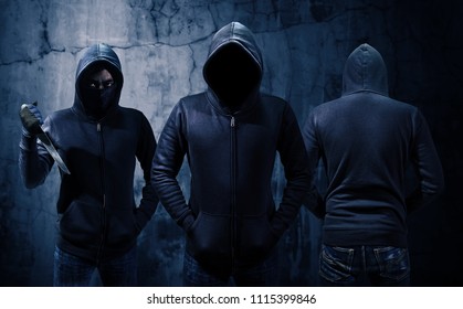 Gang Of Robbers Or Burglars Dressed In Black 