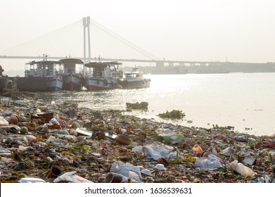 Ganges Water Pollution Polluted Holy Ganga With Human Waste, Industrial Leftovers, Domestic Sewage And Religious Rituals From Towns Cities Poses Threat To Health Environment. Kolkata India May 2019