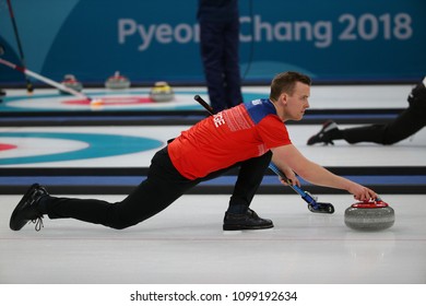 GANGNEUNG, SOUTH KOREA - FEBRUARY 10, 2018: Kristin Skaslien and Magnus Nedregotten of Norway compete in the Mixed Doubles Round Robin curling match at the 2018 Winter Olympics