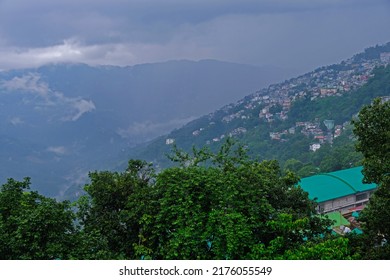 Gangtok, Sikkim - June 16 2022, Tourists Enjoy A Rope Way Cable Car Ride Over Gangtok City. Amazing Aerial City Scape Of Sikkim. Covered In Mist Or Fog. North East India Tourism,  Aerial Cityscape.