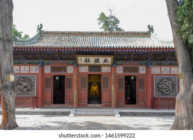 Gansu, China - May 17, 2018: Taiji Or Tai Chi Hall In Fuxi Temple With Fuxi Statue Inside & Old Cypress Trees, Tianshui, Gansu. Fuxi Was The Father And First Emperor For All Chinese People. 