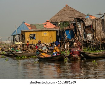 Ganvie, Benin – 31/12/2019. Village on a lake, people travel by boat and live in houses on stakes.
