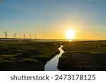 Gaomei Wetlands Area wind turbines in sunset time, a flat land which spans over 300 hectares, also a popular scenic spots in Qingshui District, Taichung City, Taiwan