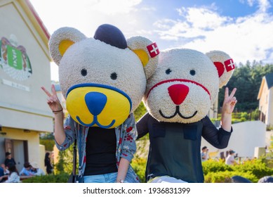 Gapyeong, Gyeonggi-do, South Korea - August 26, 2017: Two Women Are Posing Wearing Bern Bear(the Symbol Of The Swiss Capital Bern) Masks At Edelweiss Swiss Theme Park.