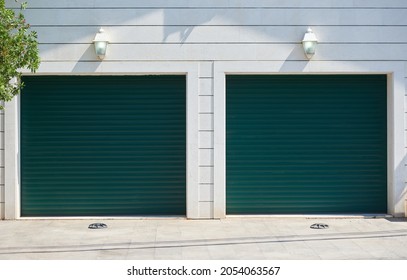 Garage With Automatic Rolling Gates For Two Cars