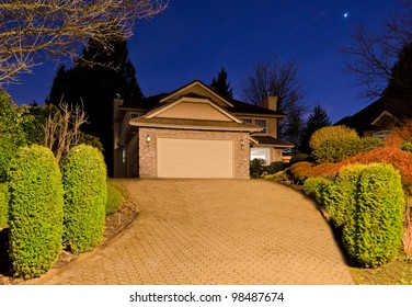 The Garage With Big Driveway  At Dusk (night, Dawn )  In Vancouver, Canada