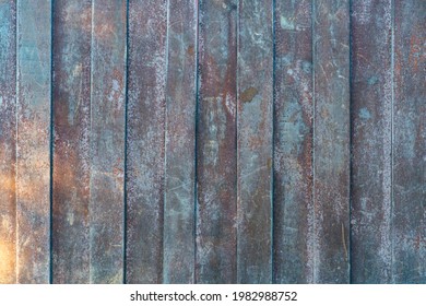 Garage Corrosion On A Rough Striped Metal Wall Or Floor, Scratches, Air Holes, Rusty House Fence, Holes, Dents, Pins.