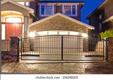 Garage Door Behind The Metal Gates At Night