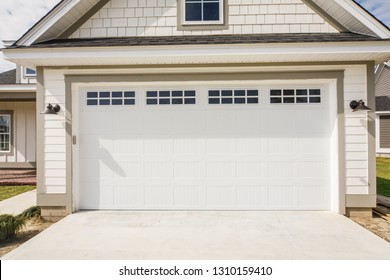 Garage Door Of New Construction House In The Suburbs