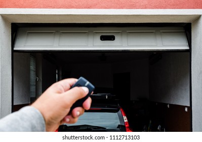 Garage Door PVC. Hand Use Remote Controller For Closing And Opening Garage Door.
