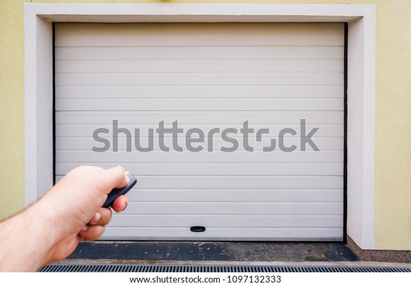 Garage door PVC. Hand use remote controller for
closing and opening garage
door.