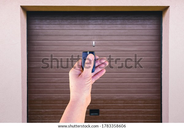 Garage door PVC. Hand use remote controller for
closing and opening garage
door
