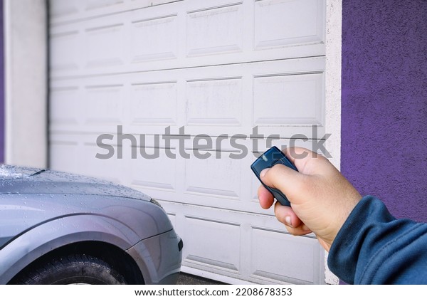Garage door PVC. Hand use remote controller for
closing and opening garage door
