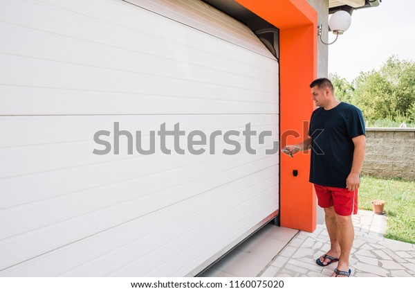 Garage Door Pvc Man Use Remote Stock Photo Edit Now 1160075020