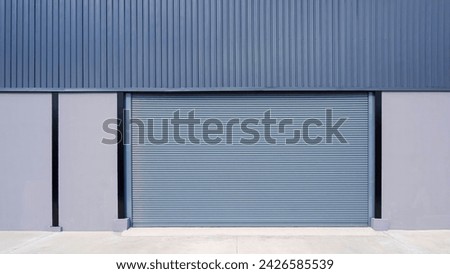 Garage Door of Warehouse Factory Building, Automatic Roller Shutter Metal Gate of Industrial Storage on Exterior Concrete Wall Background in Architecture Modern Design with White Pavement Floor